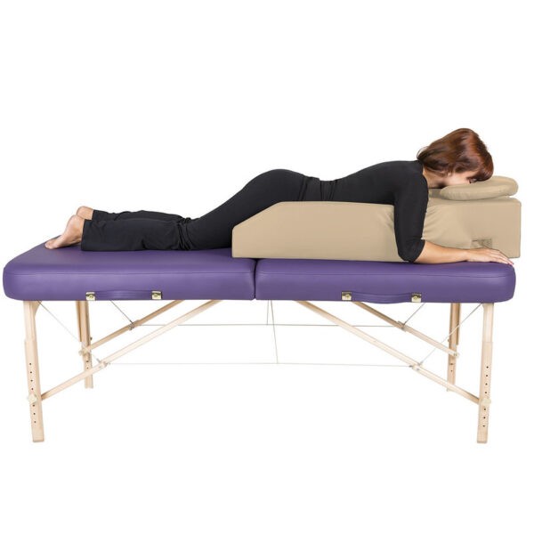 pregnancy bolster with pregnant woman on massage table